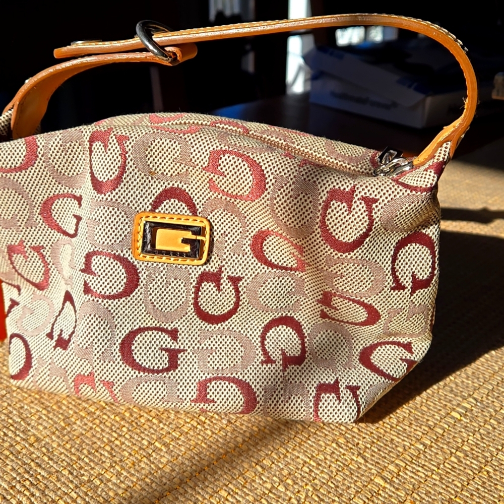Guess Logo small Canvas clutch  8"x 5""